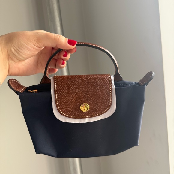 Longchamp Handbags - Longchamp Le Pliage Makeup Bag in Navy